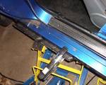 Next I raised the exhaust to the floorboards with the motorcycle jack, and clamped it in place